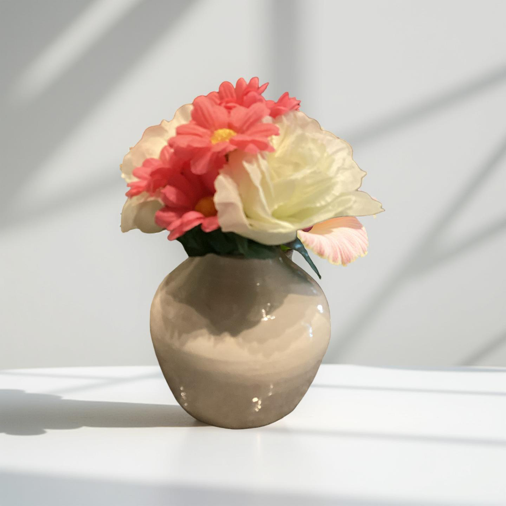Florero Petit arrena